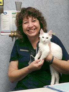Vet Dr Repeta with Snow the Cat